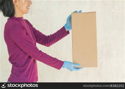 Close up cropped hands hold brown clear empty blank craft paper bag food for takeaway isolated on white background. packaging template mock up. delivery service concept. copy space. advertising area.