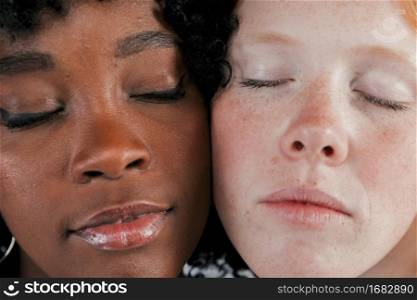 close up dark fair skin woman s face with eye closed