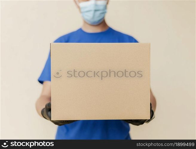close up delivery man holding box. Resolution and high quality beautiful photo. close up delivery man holding box. High quality beautiful photo concept