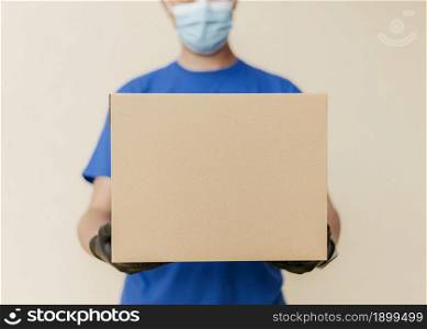close up delivery man holding box. Resolution and high quality beautiful photo. close up delivery man holding box. High quality beautiful photo concept