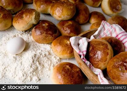 Close up detail of freshly baked hot cross buns in romantic renaissance lighting.