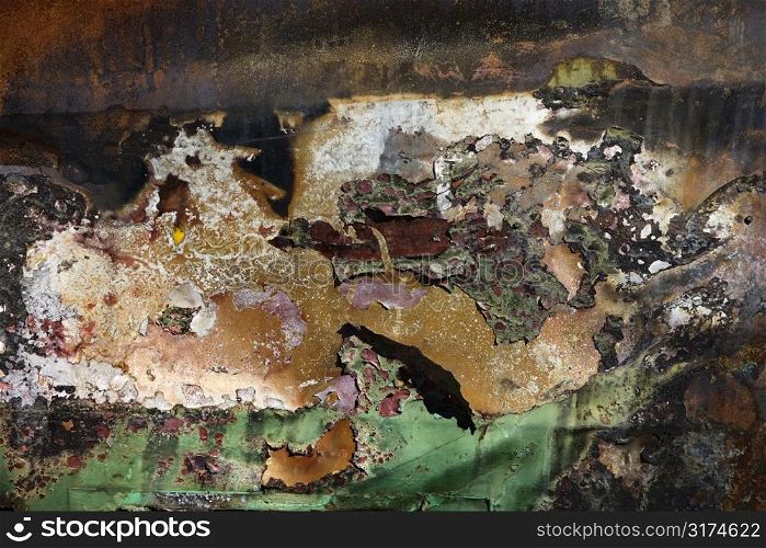 Close-up detail of old abandoned and rusted car.