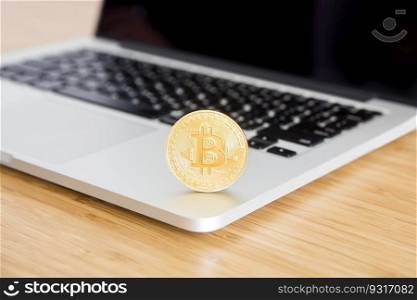Close up detail view at cryptocurrency bitcoin on laptop