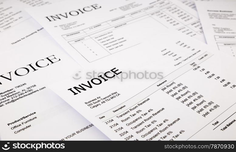 close-up difference invoices and bills, document and paperwork