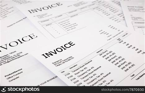 close-up difference invoices and bills, document and paperwork