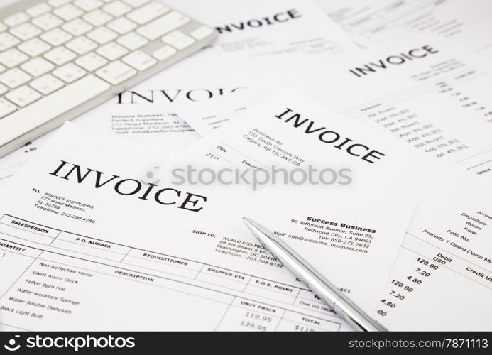 close-up difference invoices and bills, paperwork at office, concept and ideas