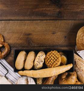 close up different fresh baked bread wooden table