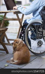 close up disabled man with cute dog