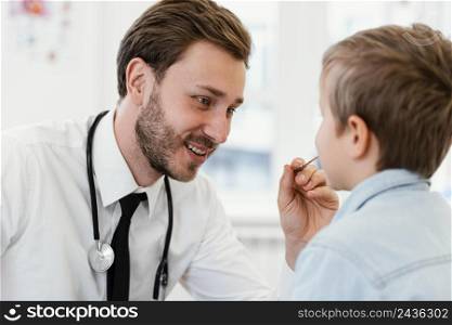 close up doctor checking kid