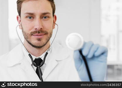 close up doctor holding stethoscope