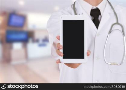 close-up doctor showing tablet computer blank screen in hospital