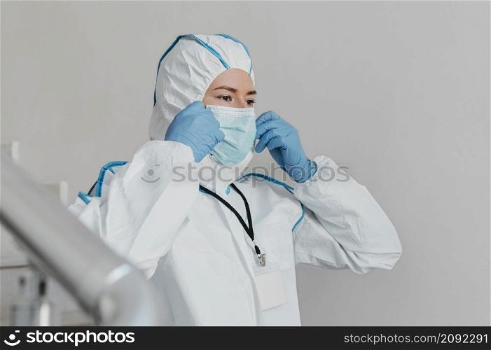 close up doctor wearing protective wear