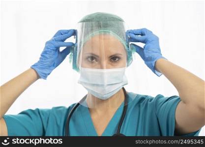 close up doctor wearing surgical mask