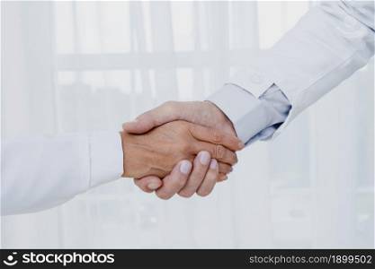 close up doctors shaking hands. Resolution and high quality beautiful photo. close up doctors shaking hands. High quality beautiful photo concept