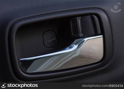 Close up Door handle inside the car, Safety Concept