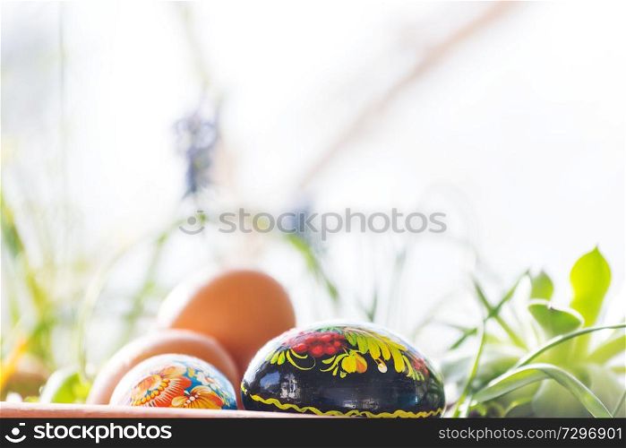 Close up Easter eggs in a basket. Spring easter background.