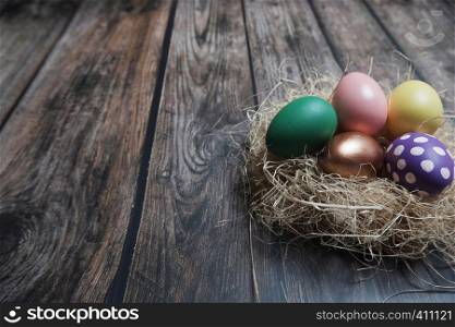 Close up Easter eggs on wooden table