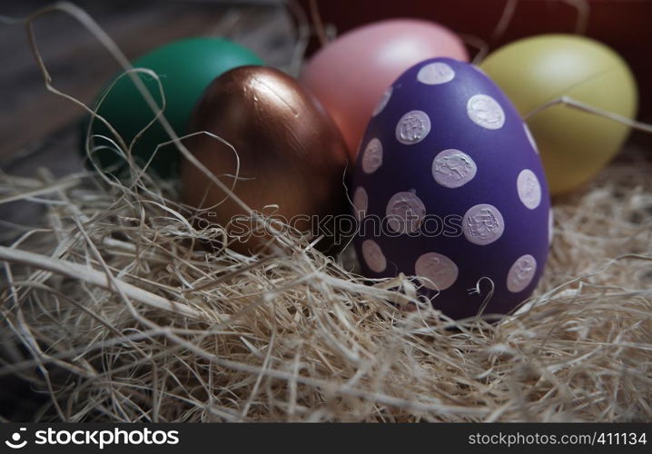 Close up Easter eggs on wooden table