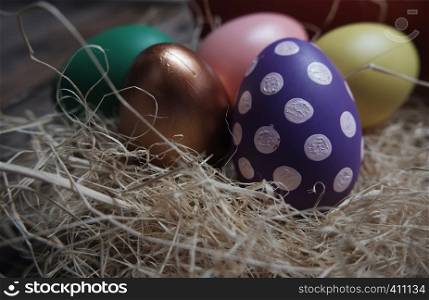 Close up Easter eggs on wooden table