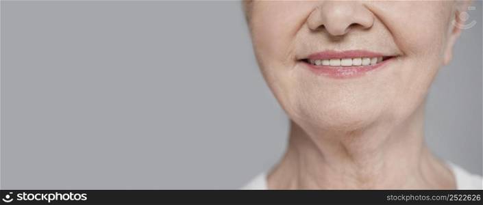 close up elderly smiling with copy space