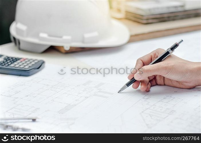 close up engineer architecture working on blueprint, building concept