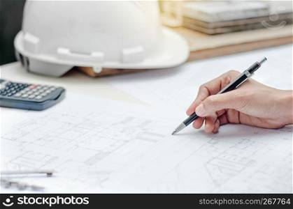 close up engineer architecture working on blueprint, building concept