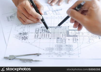 close-up engineer team Drawing Plan on Blue Print with architect equipment