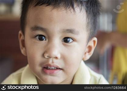 close up eyes looking to camera and face of one year old asian toddle