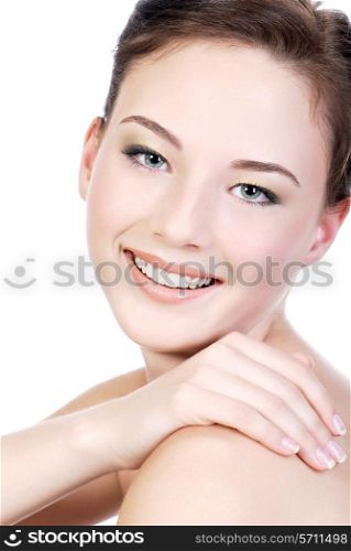 Close-up face of a beautiful teenage woman with a good white skin