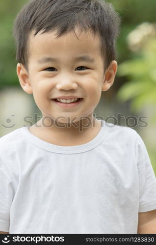 close up face of asian children looking to camera