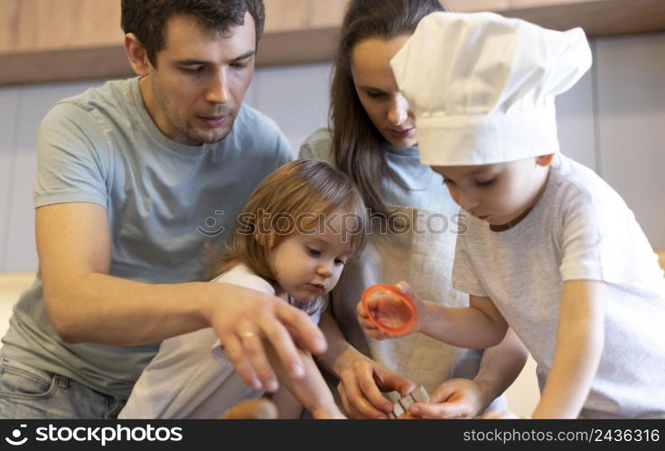 close up family members cooking