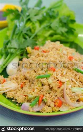 close up fish roe with mix vegetable, served with fresh green vegetable , spicy and sour food