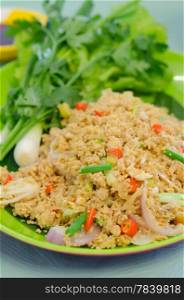 close up fish roe with mix vegetable, served with fresh green vegetable , spicy and sour food