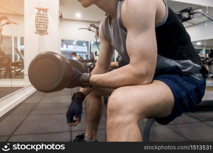 Close up fitness man exercise in the Gym