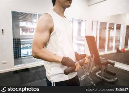 Close up fitness man hand is workout in the gym