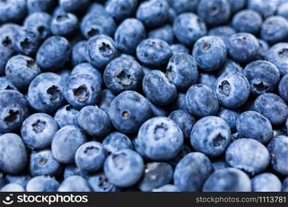 Close up fresh blueberries grouped macro healthy meal. Close up fresh blueberries grouped macro background