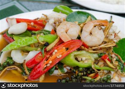 close up fried herbal vegetables with mix seafood