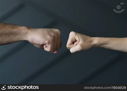 close up friends ready touch fists. Beautiful photo. close up friends ready touch fists