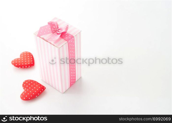 Close up gift box with heart on white background