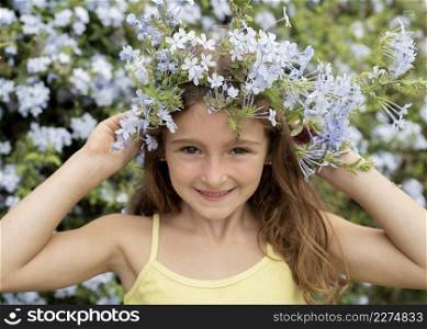 close up girl posing with flowers