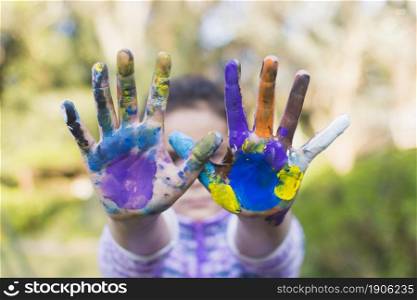 close up girl showing painted hands. High resolution photo. close up girl showing painted hands. High quality photo