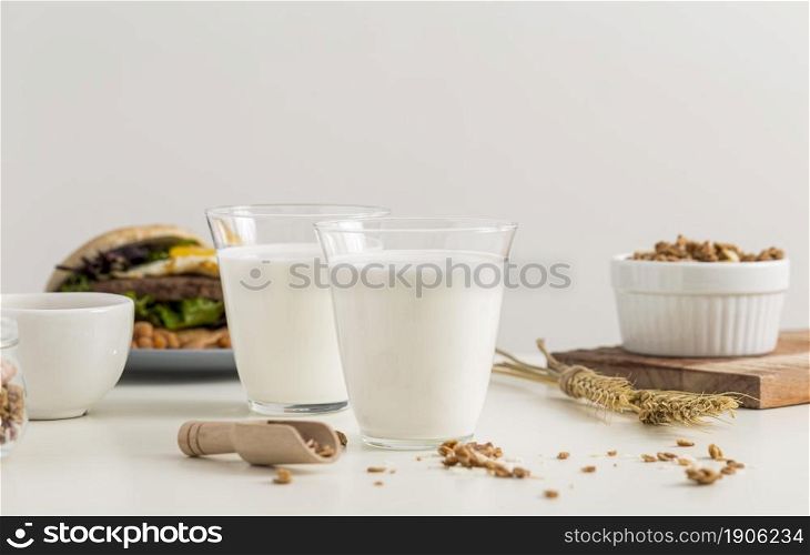 close up glasses milk ready be served. High resolution photo. close up glasses milk ready be served. High quality photo