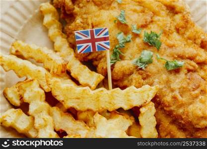 close up great britain flag fish chips dish