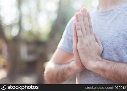 close up guy with hands together. High resolution photo. close up guy with hands together. High quality photo