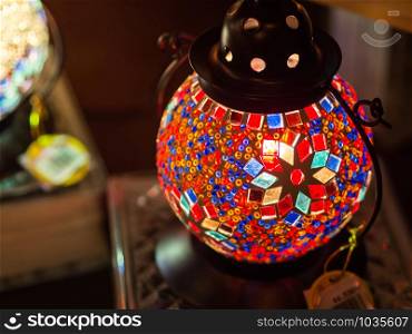 Close up hand made mosaic lamp for decoration in souvenir shop at Hokkaido, Japan.