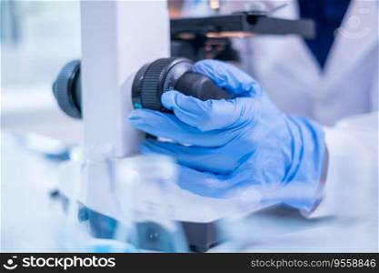 Close-up hand microscope equipment in virus epidemic analysis experiment research test discovery, human hand doctor glove scientist technician chemist medicine chemistry biotechnology microbiology lab