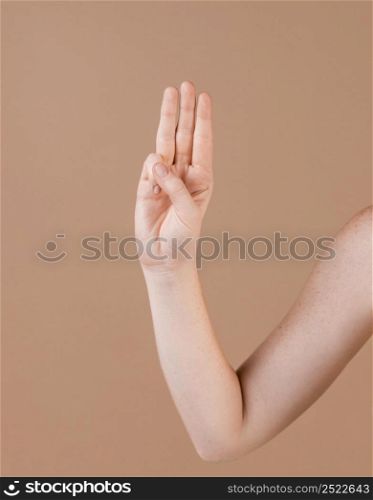 close up hand teaching sign language 10