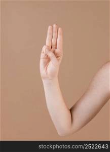 close up hand teaching sign language 10