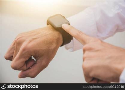 Close up Hand  touch on smartwatch technology