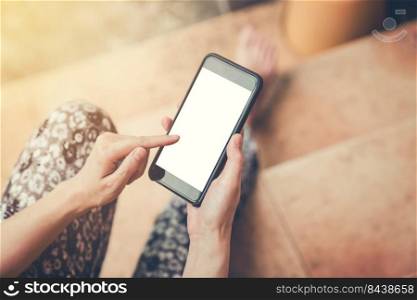 Close up hand woman holding and using phone on isolated with clipping path.